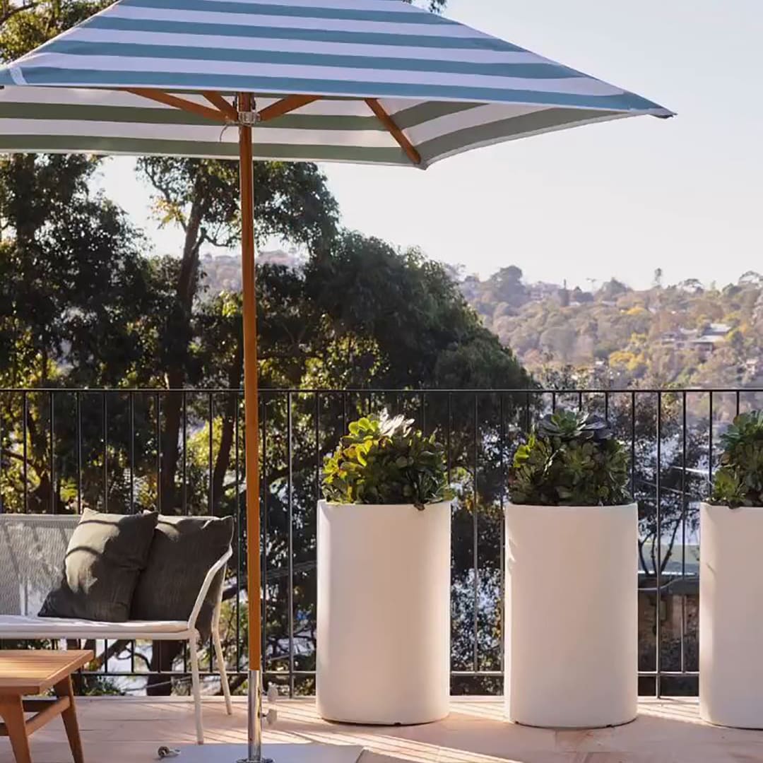 Eco-friendly Sundial+ Umbrella featuring a recyclable aluminum frame, marine-grade components, and elegant color.