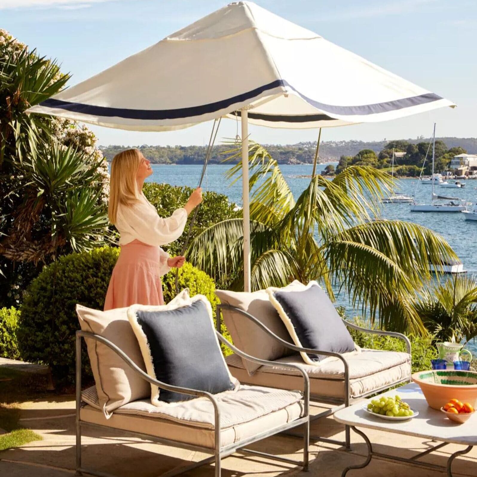 Modern Regatta Patio Umbrella by Basil Bangs with sleek aluminum frame, UPF50+ sun protection, and marine-grade hardware for outdoor use.