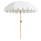 Elegant white Luxury Umbrella by Basil Bangs with UPF50+ sun protection, marine-grade fabric, and durable hardwood pole.