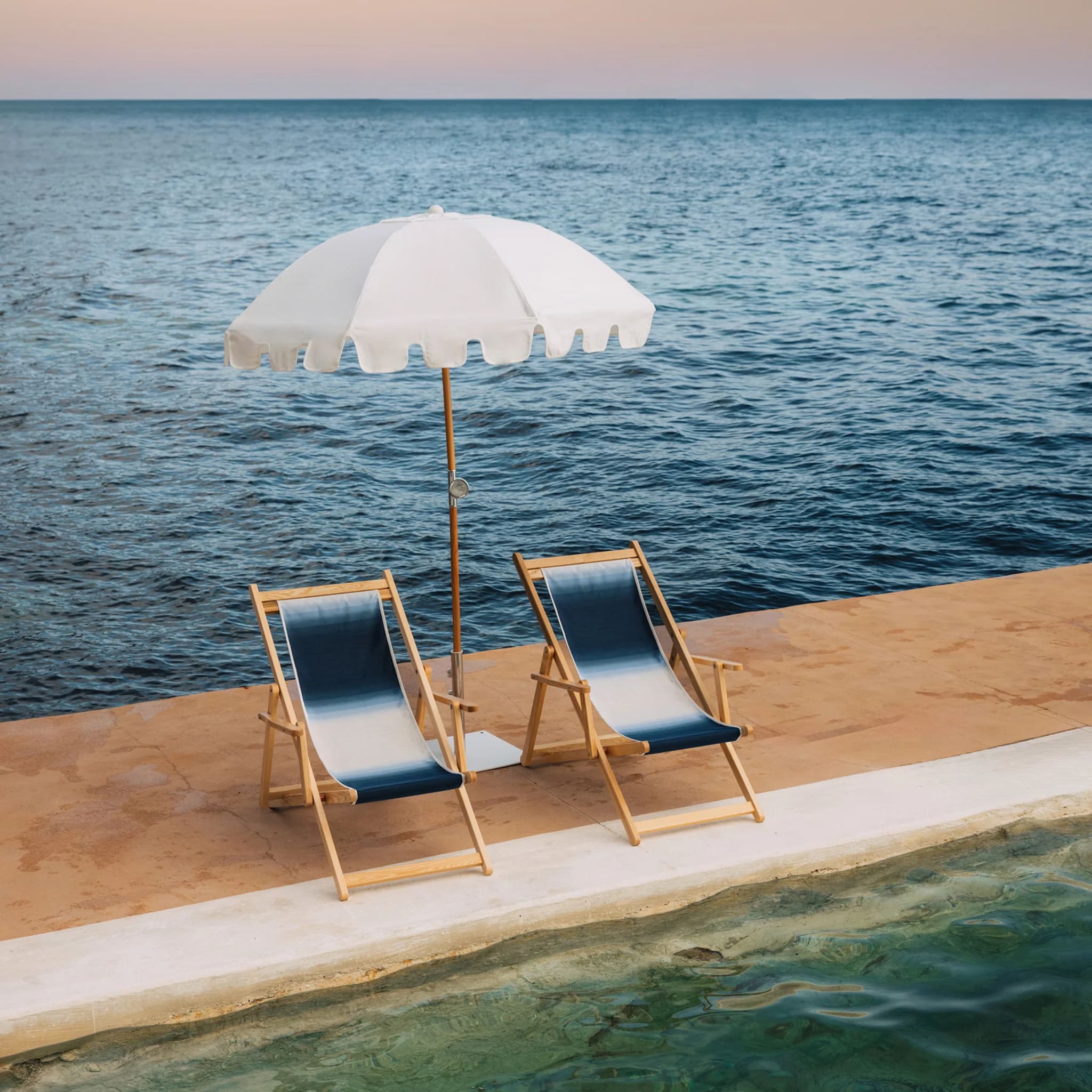 Durable and stylish Luxury Umbrella by Basil Bangs, perfect for lakeside retreats with UPF50+ sun protection.
