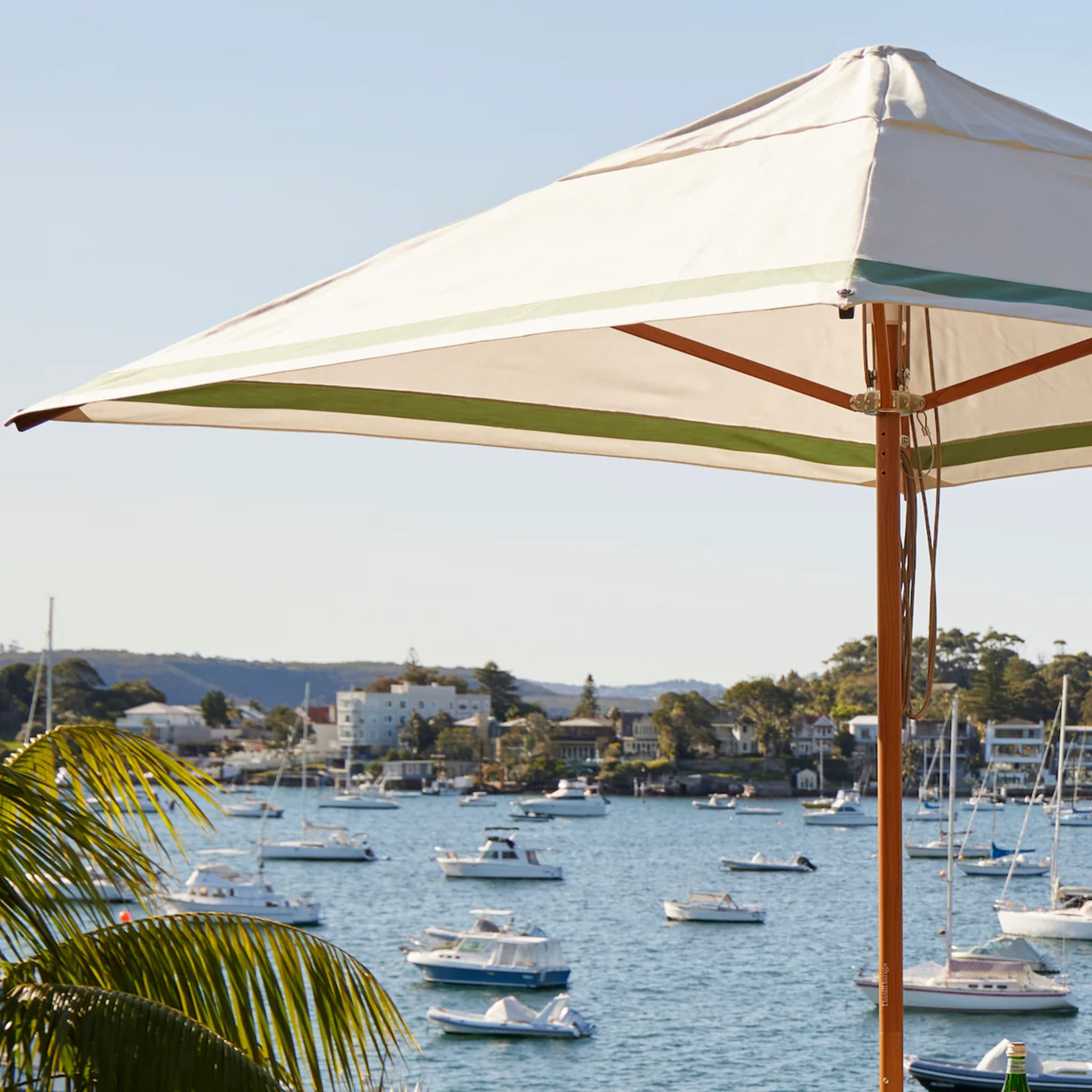 High-performance Regatta Patio Umbrella by Basil Bangs engineered to endure "Gale Force" winds and provide lasting outdoor comfort.